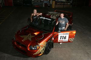 Nate and Brandye Conley pose with "Bullet", the car they built especially for the 2008 X Games.