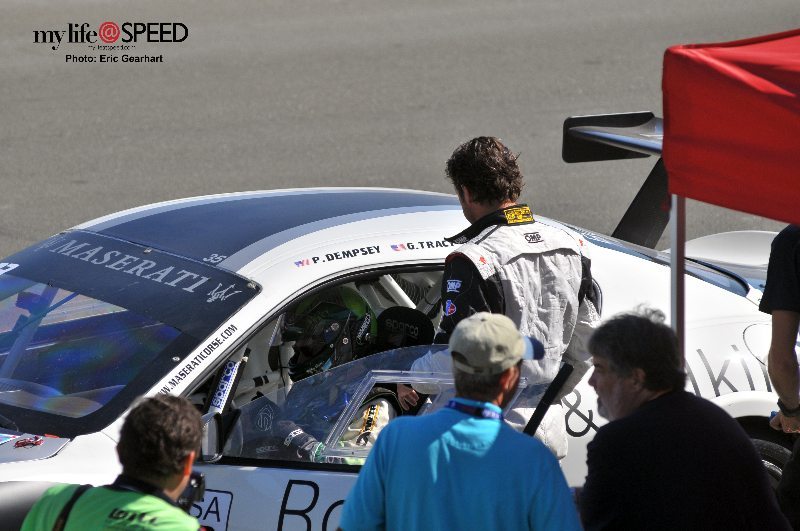 Patrick Dempsey and Greg Tracy during a practice session on pit lane.