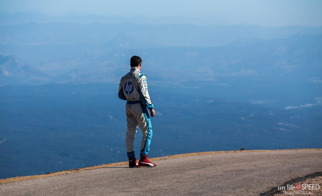 Indycar favorite, Simon Pagenaud, looks out over the expansive Pikes Peak region from the top of middle section practice.