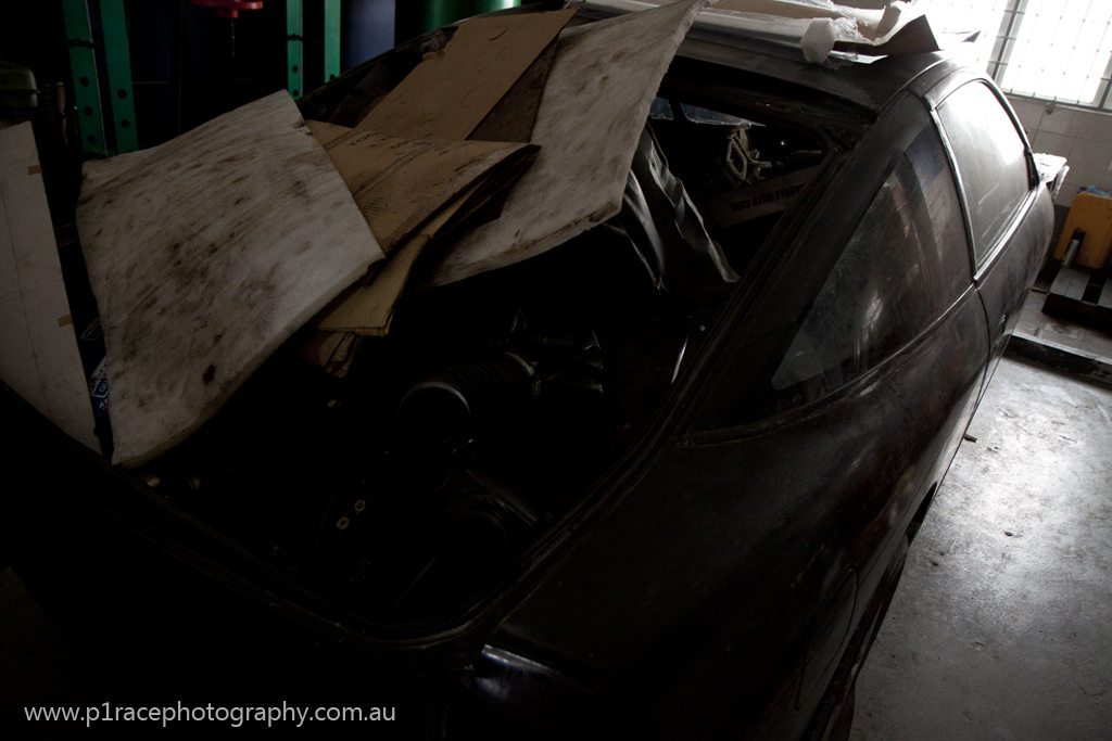 D Garage - Black Nissan 180SX - junk inside 1