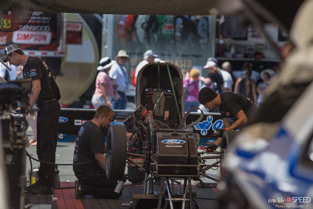 Bob Tasca's team getting his Funny Car ready for action.