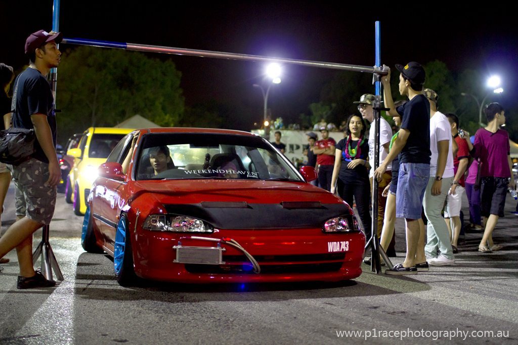 Speed City drift night - Limbo competition - Red Honda Civic hatch - front three-quarter shot 13