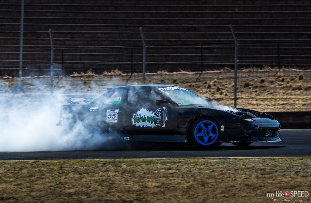 Crick Filippi of Team Burn the Most making some smoke...from every part of the car.
