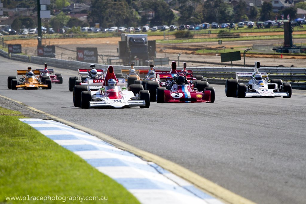 V8 Supercars 2013 - Sandown 500 - Formula 5000 - Field entering turn 1 - front three-quarter shot 1