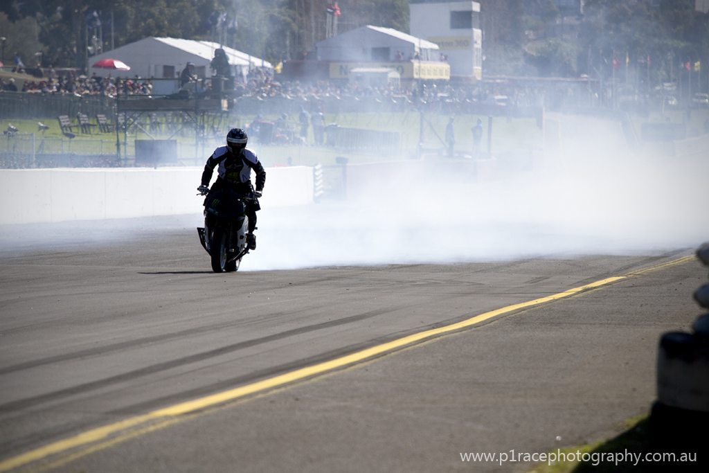 V8 Supercars 2013 - Sandown 500 - Stunt Bike burnout shot 10