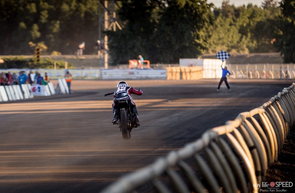 Bryan Smith heads down the front stretch and towards the checkered flag at the Sacramento Mile.