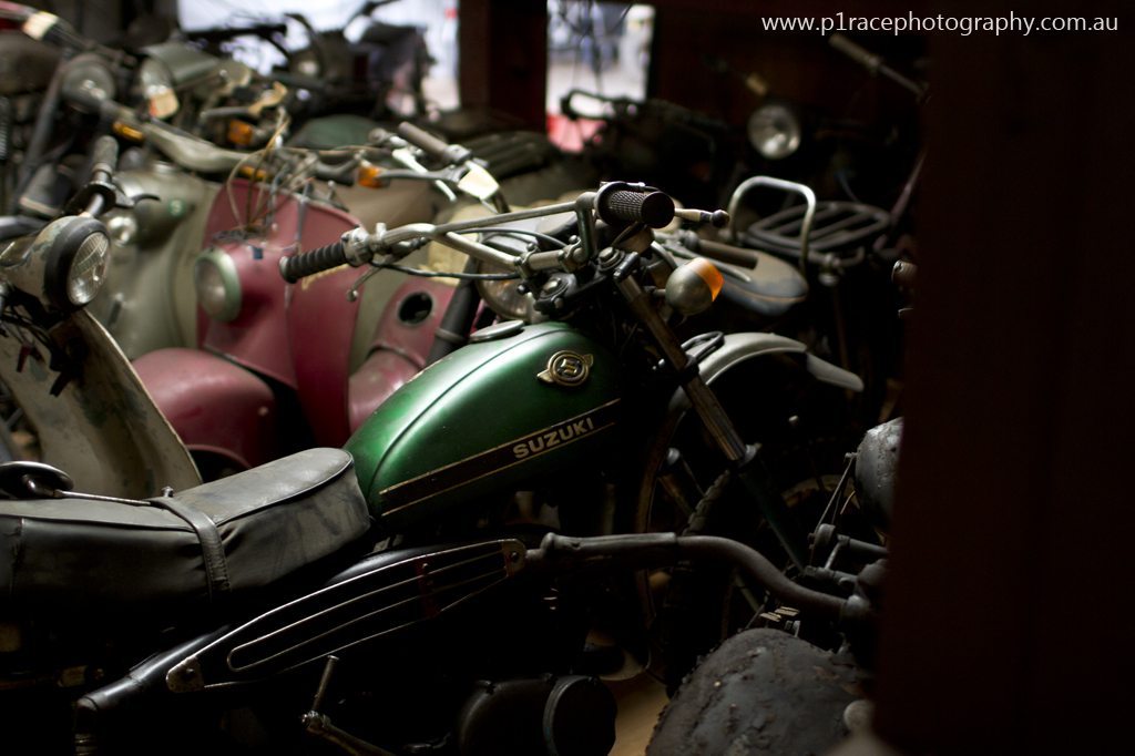 Iwashita Collection - House - Top floor - Green Suzuki motocross bike - profile shot 1