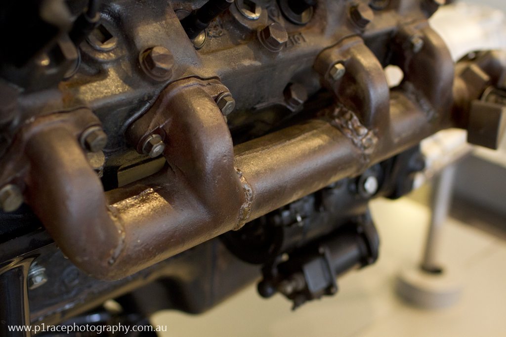 Nissan Engine Museum - 1967 W64 Prince V8 - racked and welded exhaust manifold - front three-quarter close-up shot 1