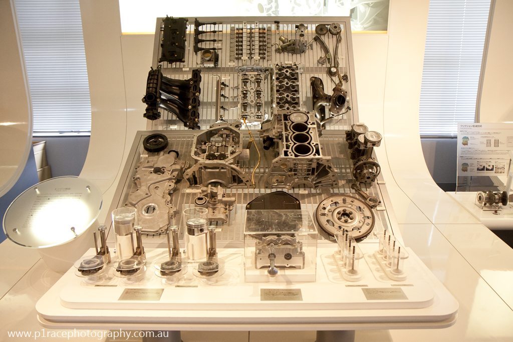 Nissan Engine Museum - Four cylinder engine exploded view - Front shot 3
