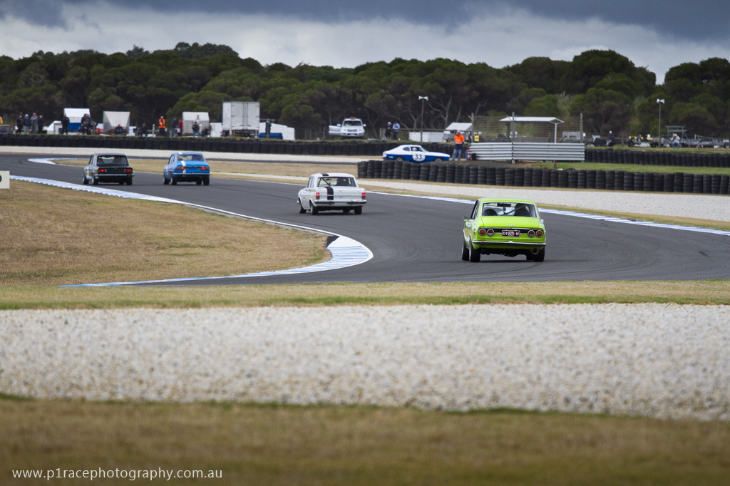 Phillip Island Classic 2014 - Friday - Ben Read - 1971 Mazda RX-2 - Turn 3 apex - rear three-quarter drift shot 1