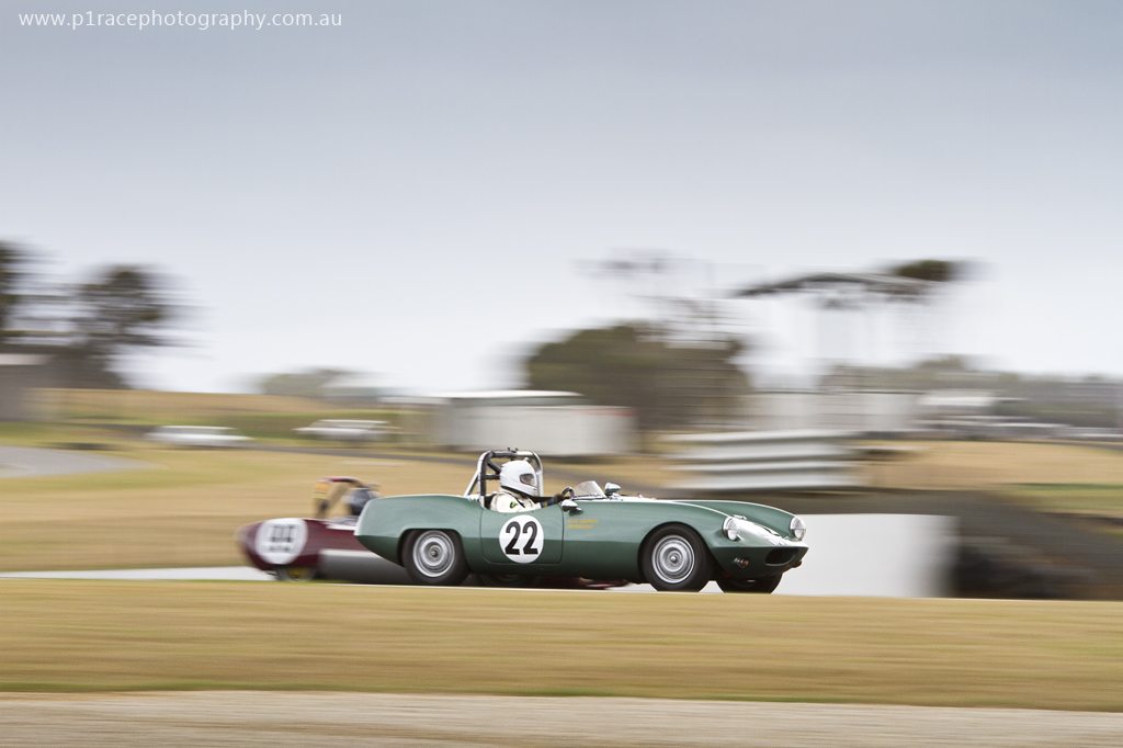 Phillip Island Classic 2014 - Friday - Nick McDonald - 1960 Elva Courier overtaking Dick OKeefe 1959 Photon Special Lotus 11 - Turn 2 exit - profile pan 3