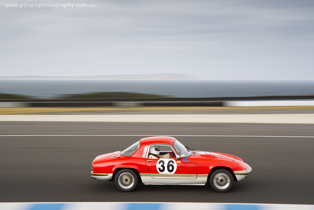 Phillip Island Classic 2014 - Friday - Rohan Hodges - 1968 Lotus Elan S4 FHC - Turn 1 apex - profile pan 2