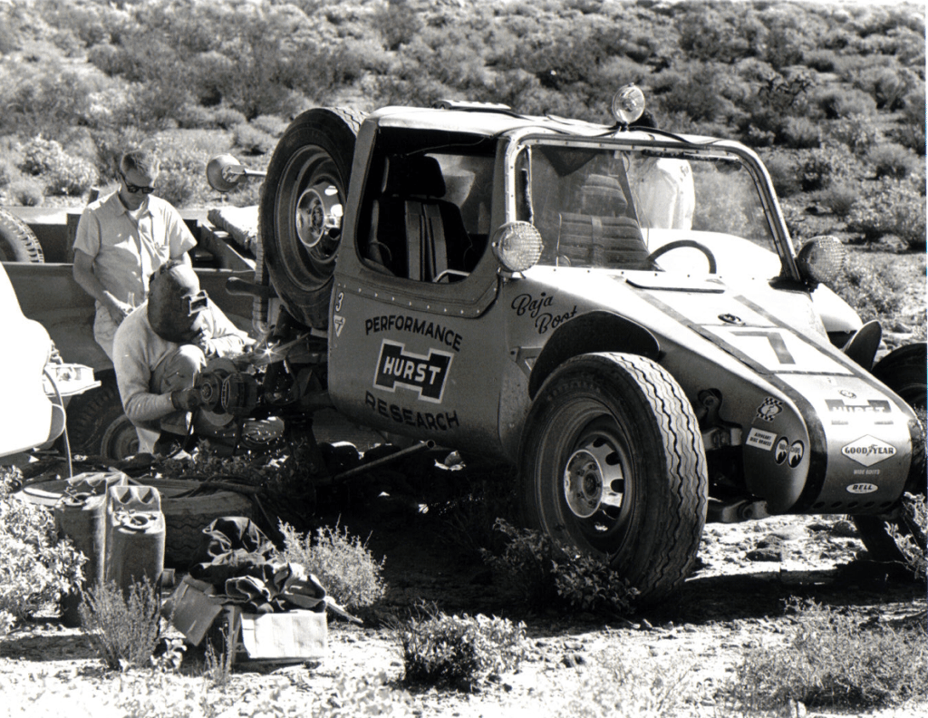 Drino Miller's first race was the inaugural 1967 NORRA Mexican 1000 as part of Vic Hickey's Hurst Performance "Baja Boot" team. Built in just 30 days, the radical Boot suffered a DNF due to a broken rear suspension. The car was later owned by Steve McQueen.  