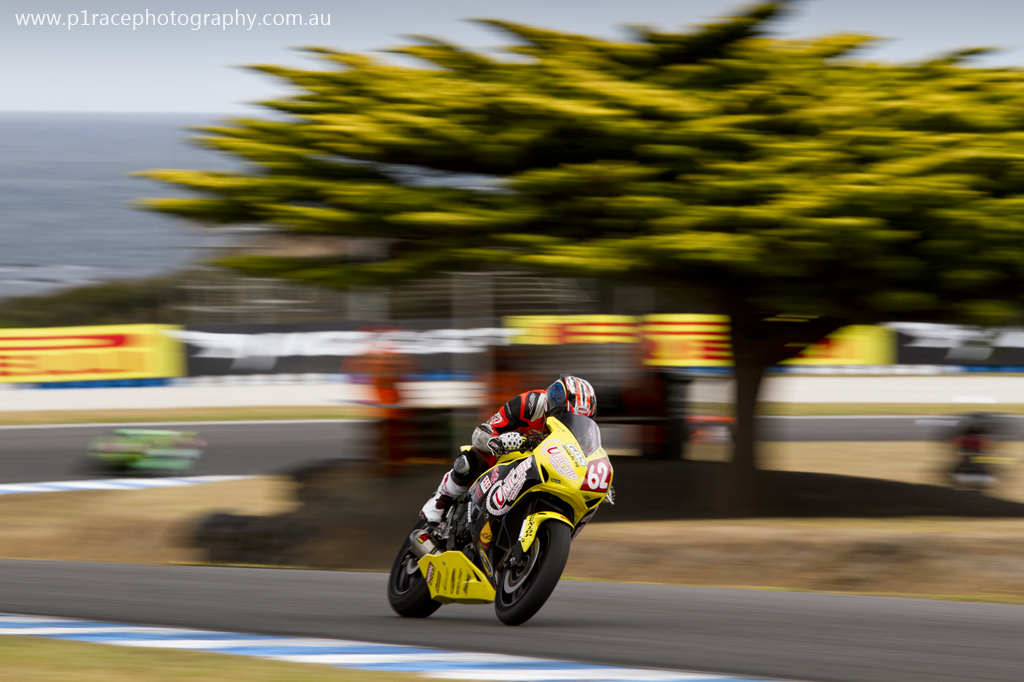 WSBK 2014 - Round 1 - Phillip Island - Saturday - Australian Superbike Prostock Race 1 - Chris Trounson - Honda CBR-RR - Turn 6 exit - front three-quarter pan 2