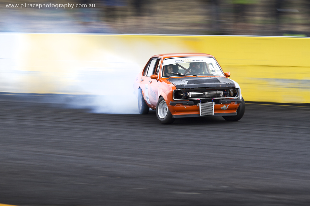 VicDrift 2014 Round 1 - Calder Park - Andrew Knight - Ford Mk II Escort - Final turn exit - front three-quarter pan 3