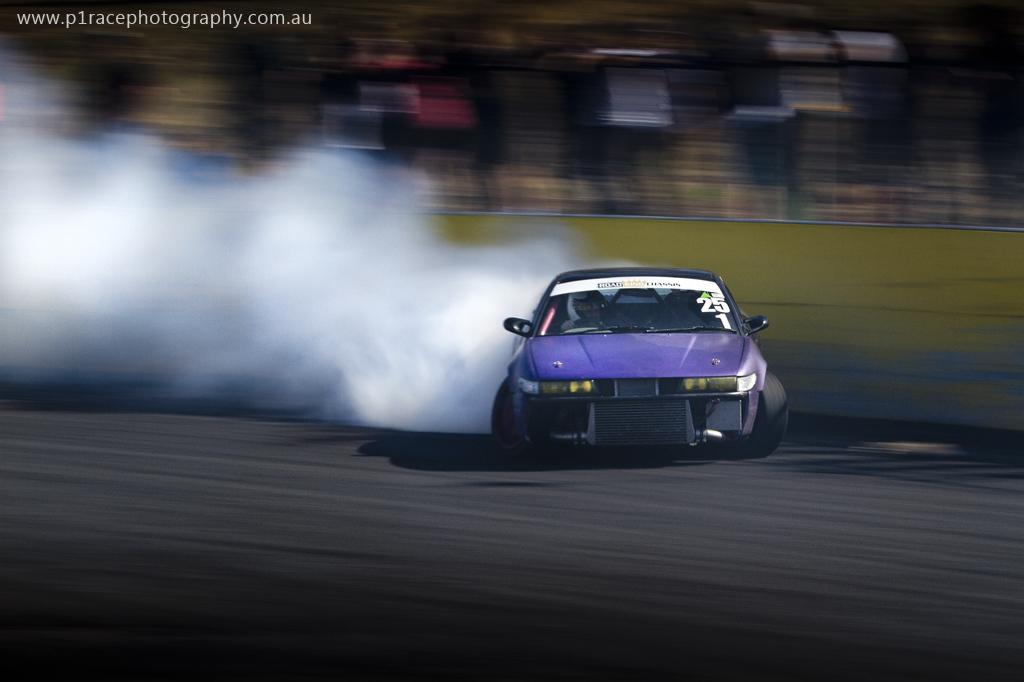 VicDrift 2014 Round 1 - Calder Park - Catherine May - Purple S13 Nissan Sileighty - Final turn - front three-quarter pan 9