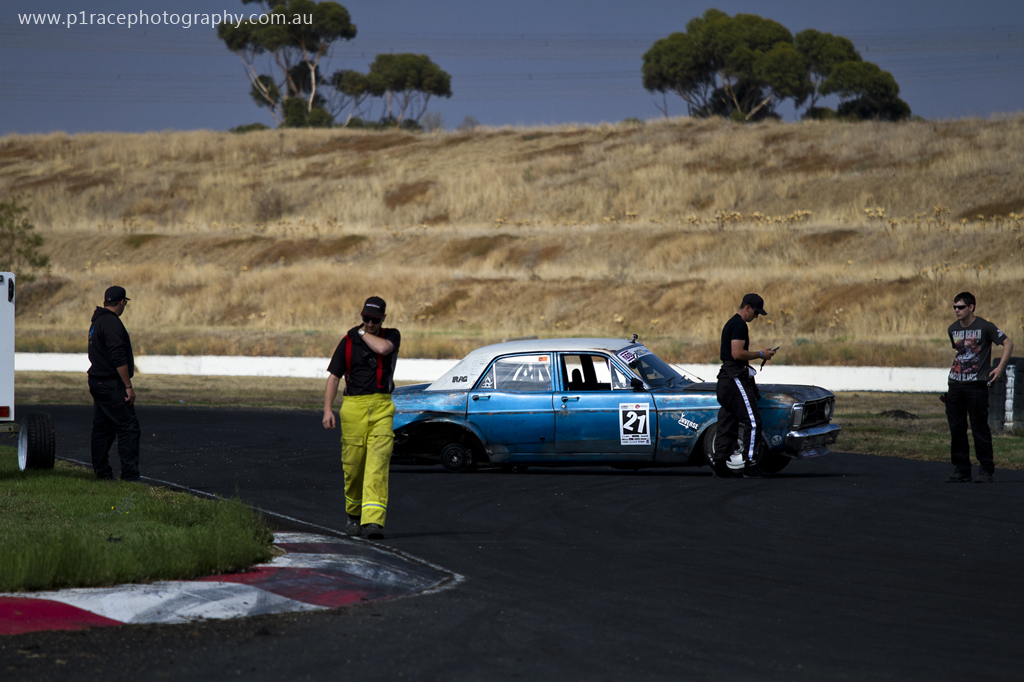 VicDrift 2014 Round 1 - Calder Park - James Mackie - XY Ford Falcon - Turn 2 exit - wheel off profile shot 4