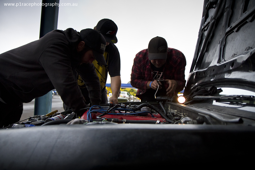 VicDrift 2014 Round 1 - Calder Park - Pits - Crew fixing engine 1