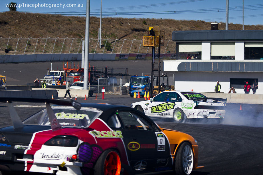 ADGP 2014 Final - Calder Park - Michael Bonney - S15 Nissan 200SX - Justin Codr - Nissan Cefiro - Final turn exit - rear three-quarter shot 1