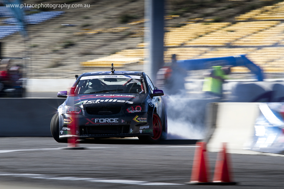 ADGP 2014 Final - Calder Park - Nick Coulson - VE Holden Commodore Ute - Final turn exit - front three-quarter pan 1