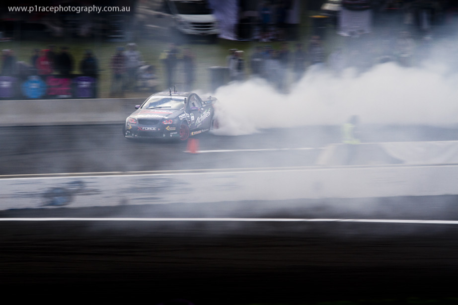 ADGP 2014 Finals - Calder Park - Nick Coulson - VE Holden Commodore Ute - Finish line - High-angle front three-quarter pan 1