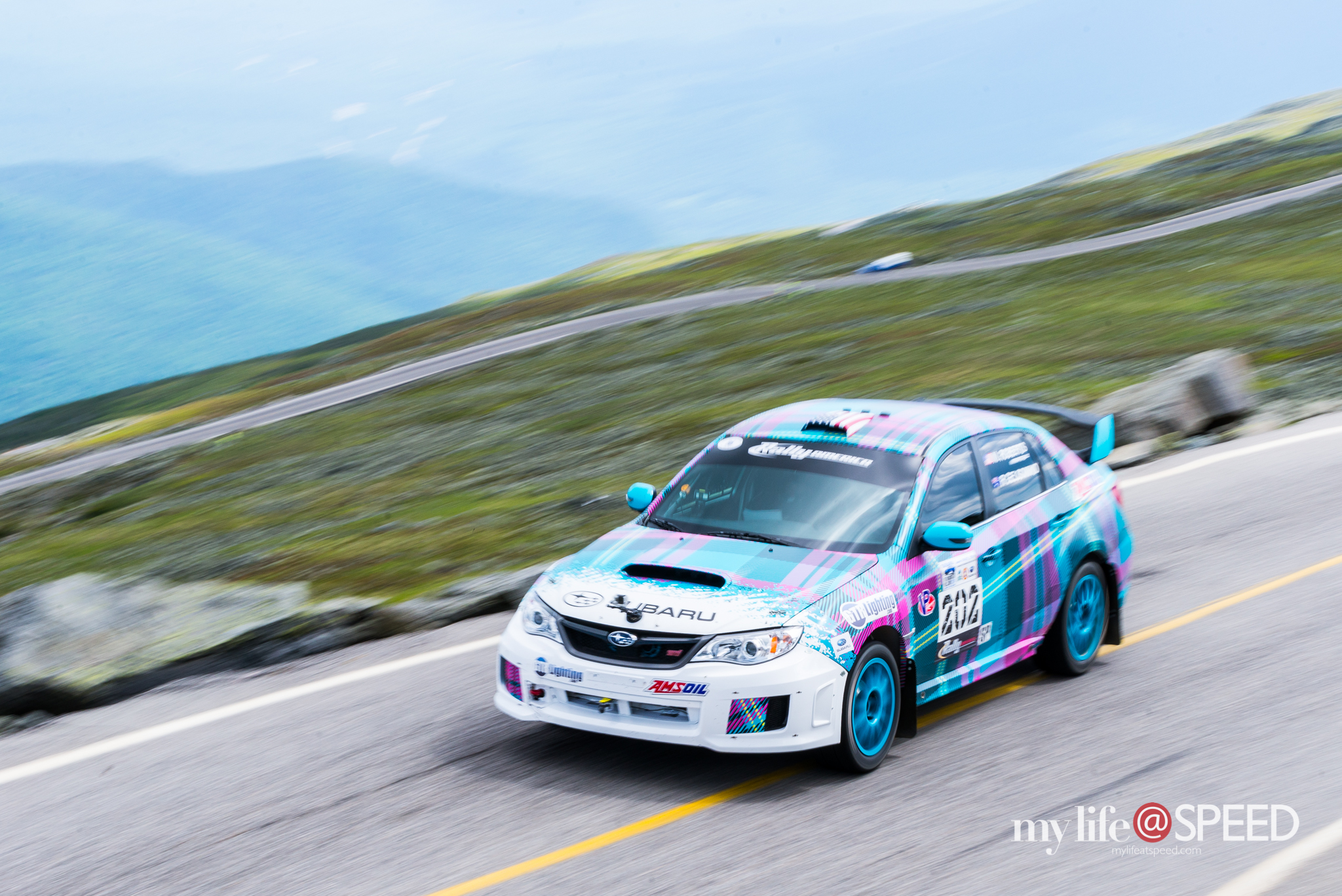202 Nick Roberts 2014 Subaru STI back at it after ripping off the left rear wheel on practice day 2.