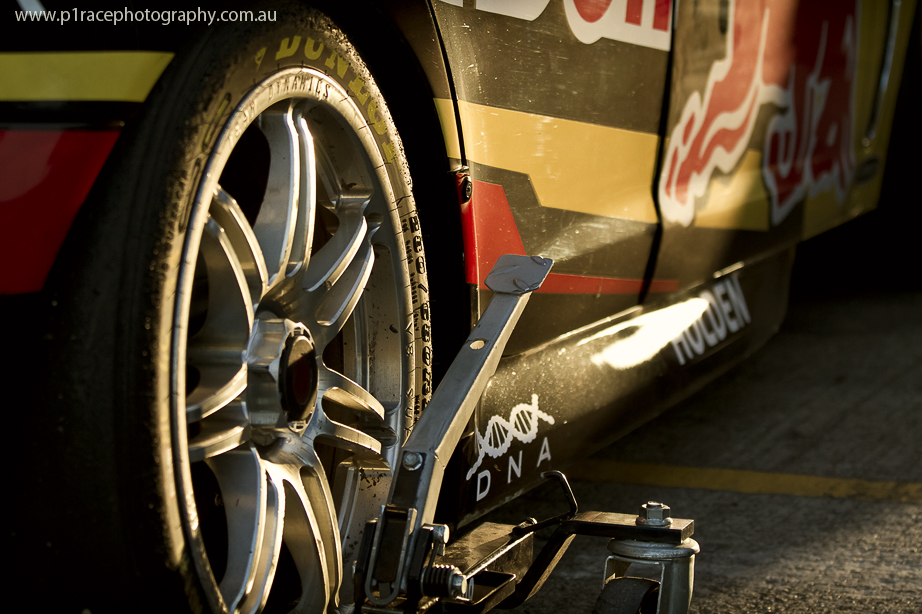 V8 Supercars 2014 - Sandown 500 - Sunday - Jamie Whincup - Paul Dumbrell - Red Bull Racing Australia - VF Holden Commodore - Pits - Post-race - Rear three-quarter wheel detail shot 4
