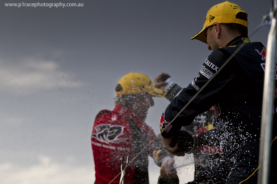 V8 Supercars 2014 - Sandown 500 - Sunday - Paul Dumbrell - Warren Luff - Podium ceremony - Champagne spray 3