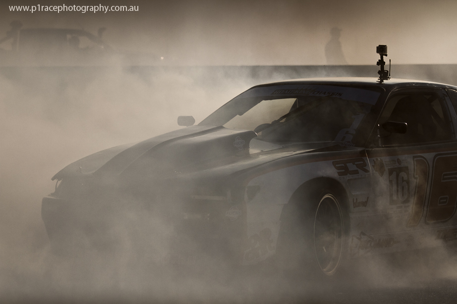 VicDrift 2014 - Round 5 - Michael Prosenik - S13 V8 Nissan Silvia - Post-presentation burnout front three-quarter shot 4