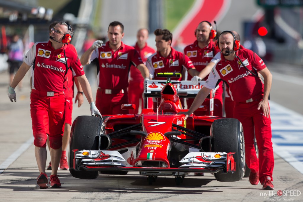 Kimi Räikkönen's car getting wheeled to post practice scrutineering