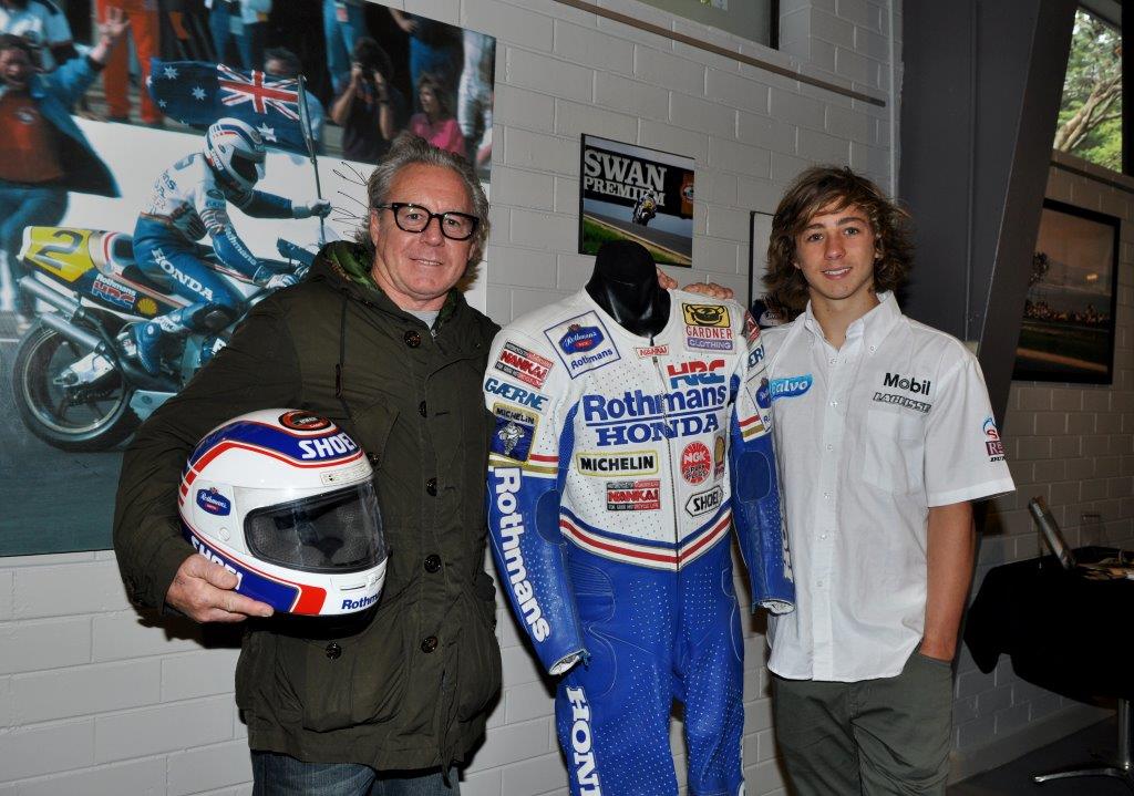 lr Wayne Gardner at Phillip Island with son Remy and his leathers and memorabilia of 1989