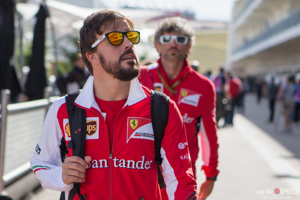 Fernando Alonso arrives at the track