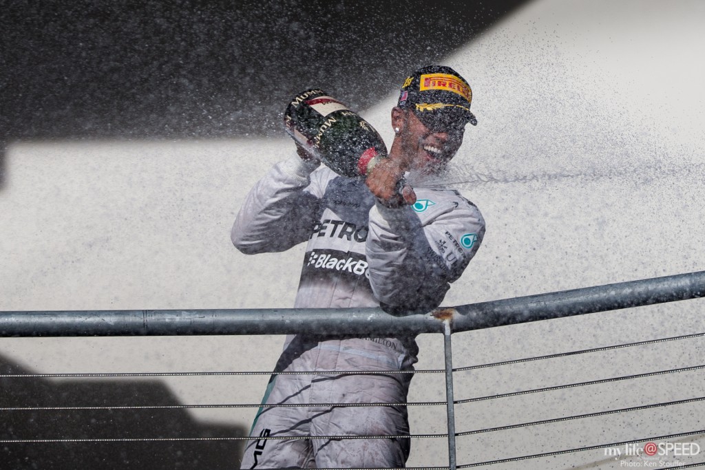 Lewis Hamilton sprays the victory champagne 