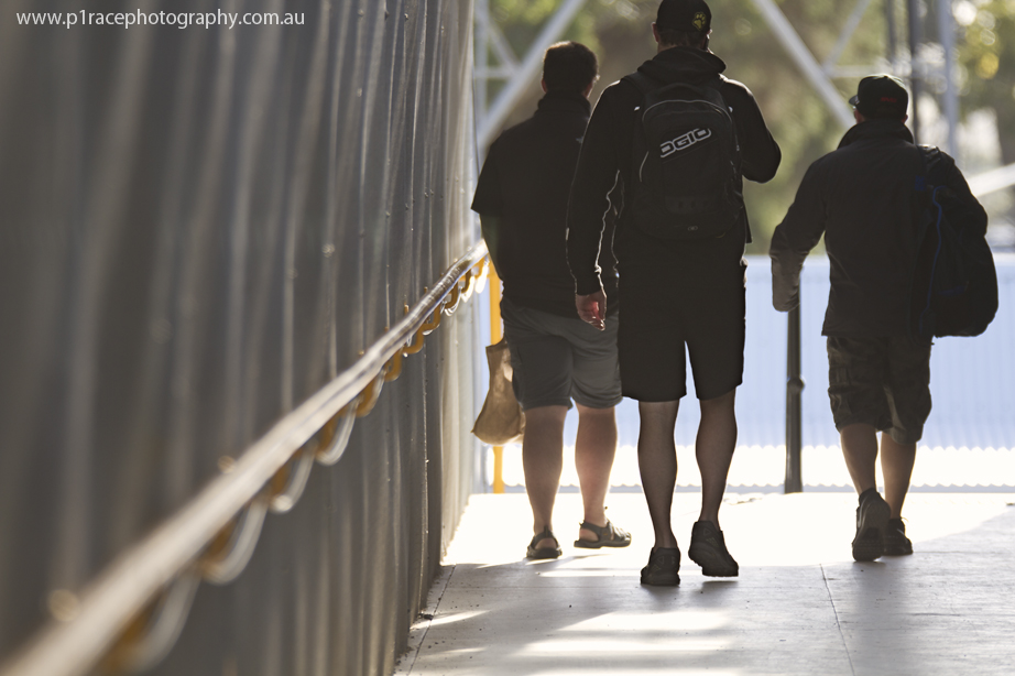 V8 Supercars 2014 - Phillip Island 400 - Sunday - Post-race - Trio walking across bridge 1