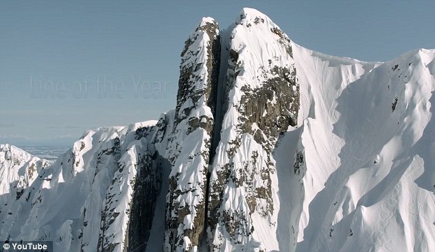 This is the moment a daredevil skier flies down a vertical crevice in the Alaskan wilderness