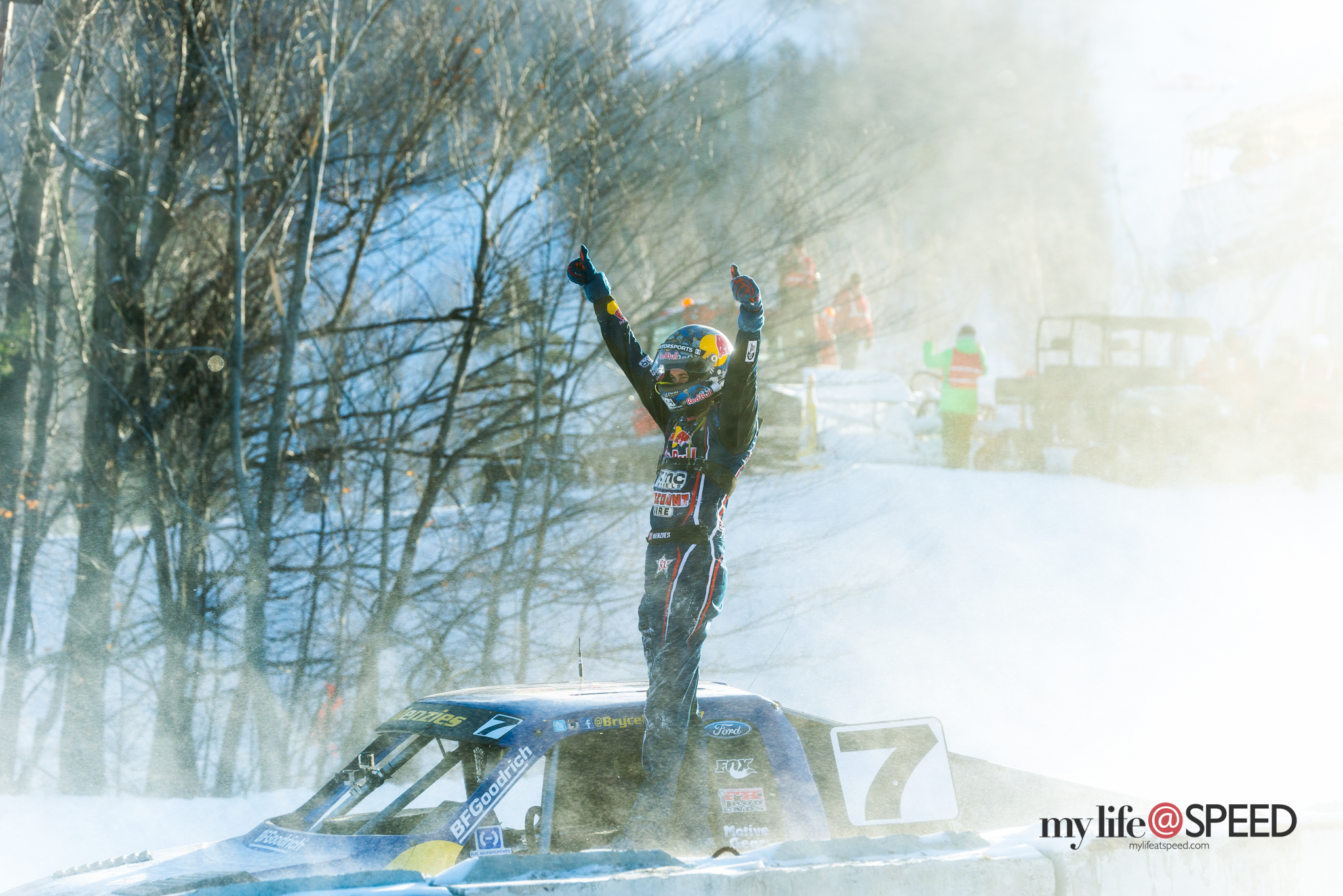 An elated Bryce Menzies is shrouded in a swath of snow as he celebrates his victory for this years Frozen Rush Championship