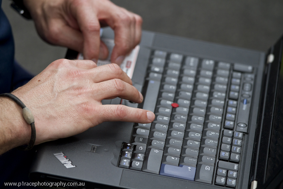 WSBK Phillip Island 2015 - WSBK Race 1 grid - Suzuki engineer working on laptop 1