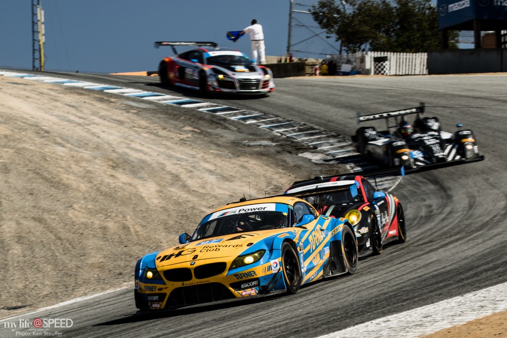 The Turner Motorsport BMW Z4 leads the pack exiting the Corkscrew