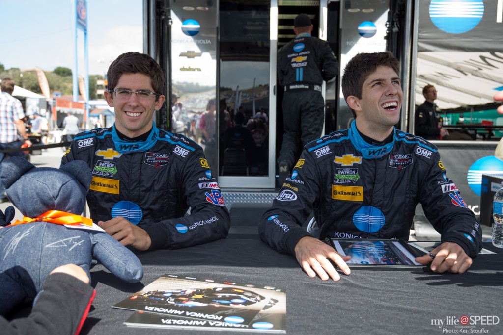 Jordan and Ricky Taylor sign autographs for the fans before the race