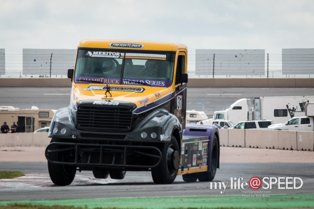 10 time British Truck Champ, Stuart Oliver, runs a few test laps with a lucky passenger after a rear end change.