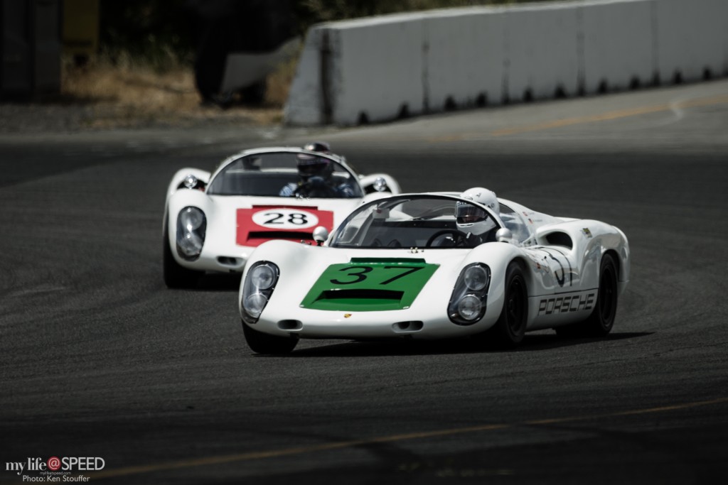 Reg Howell in the 1967 Porsche 910 leads Stephen Thein in a nearly identical 910
