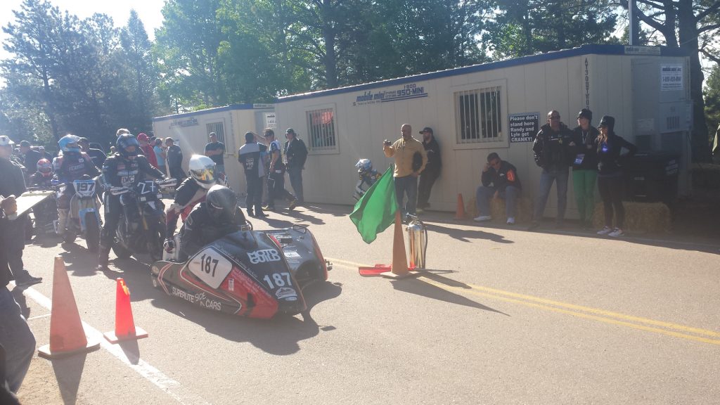 Preparing to set off for the final qualifying session, Team Johnny Killmore’s sidecar #187. Photo: Kate Kriebel